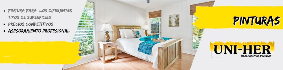 Habitación blanca con ventanas y muebles de madera